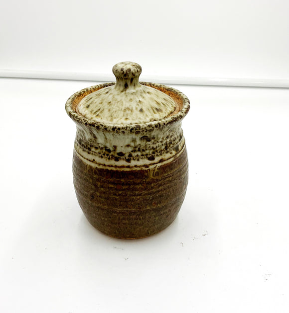 Small pottery lidded container