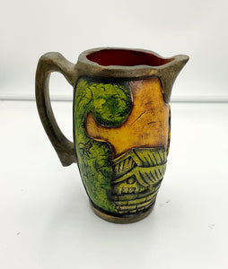 Carved Pottery Pitcher