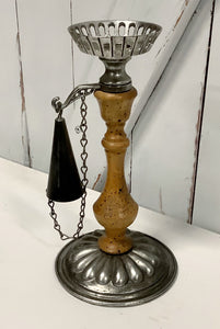 Candle holder with snuffer