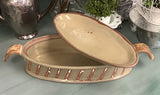 Covered pottery oval dish
