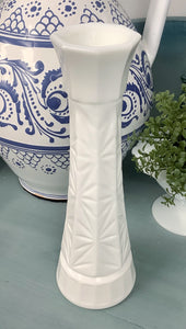 Octagonal starburst, milk glass vase