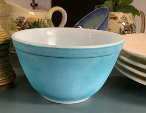 Small matte blue Pyrex bowl